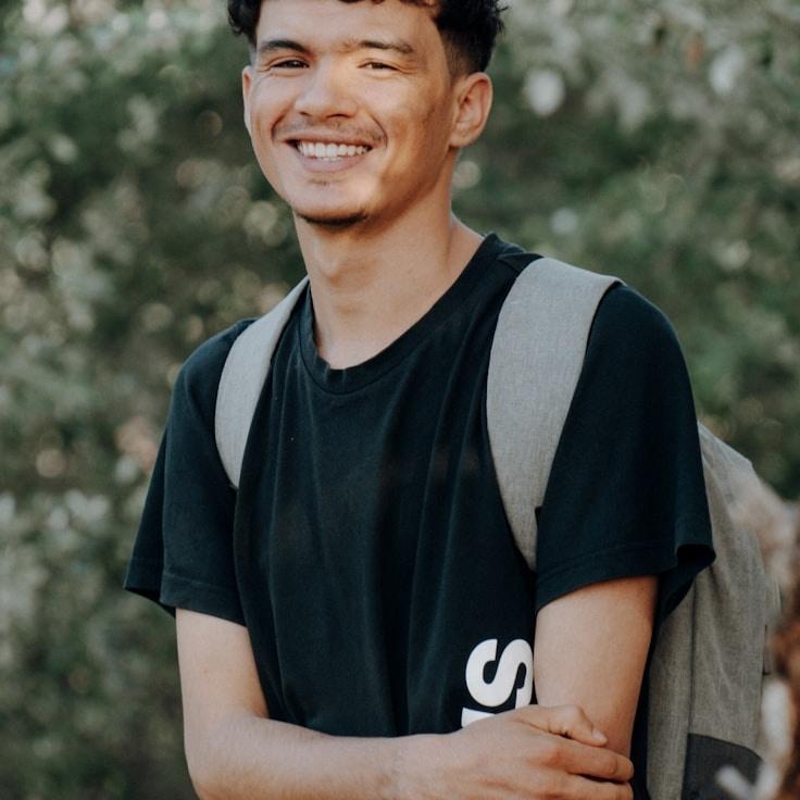 Kaveri Mehta, Lead Design Curator at Summit Garden Pulse, reviewing corporate floral arrangements